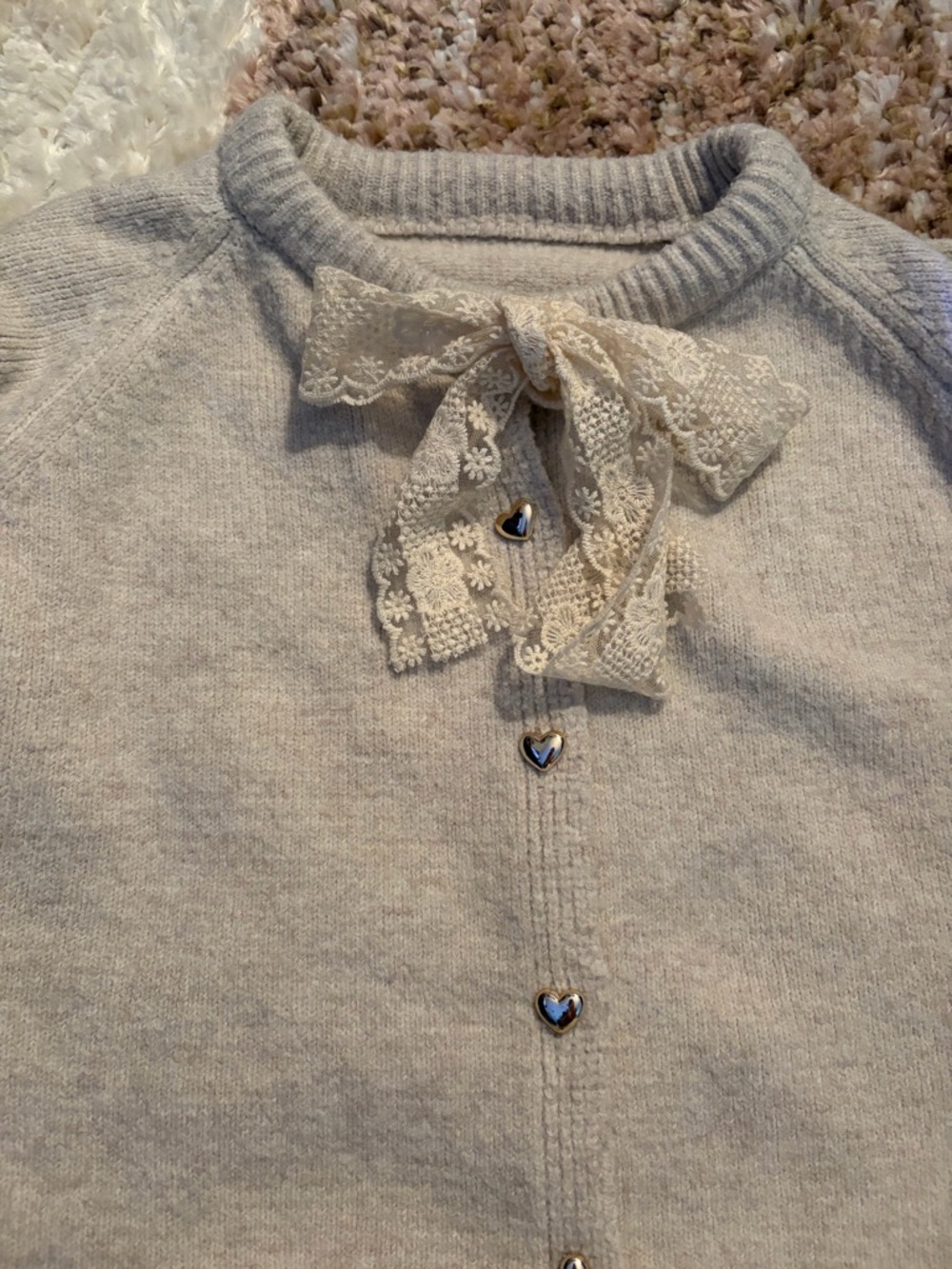 Cream cardigan with gold heart buttons with lacy bow accent Sz Med